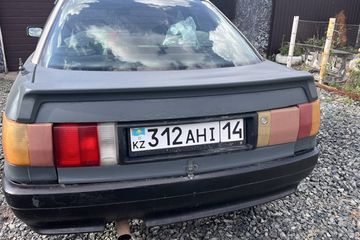 Транспортное средство марки AUDI 80, 1988 года выпуска, категории B (легковой автомобиль с разрешенной максимальной массой менее 3500 кг), государственный регистрационный номер 312AHI14, серого цвета, с объемом двигателя 1 800 куб. см, идентификационный номер (VIN) WAUZZZ89ZJA335732, расположенное по адресу: Павлодарская область, г. Павлодар, ул. Кленовая, д. 120. Согласно отчету об оценке ТОО «DV Appraisal» № 2026-62-11/122 от 05 августа 2026 года, рыночная стоимость указанного транспортного средства составляет 744 000 (семьсот сорок четыре тысячи) тенге.