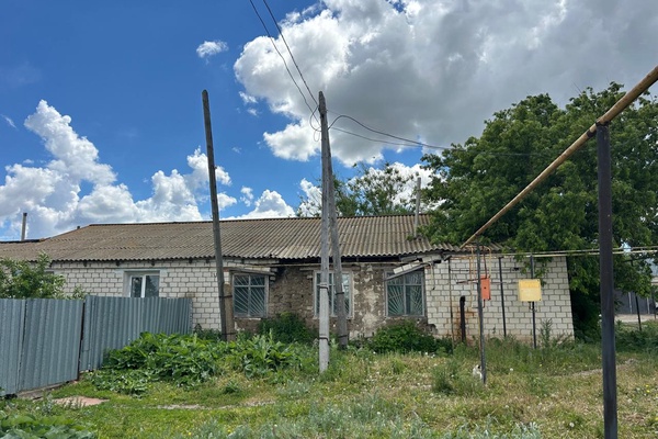 Здание АТС, общей площадью: 63,2 кв.м, сарай 20 кв.м и пристройка 18,17 кв.м с земельны…